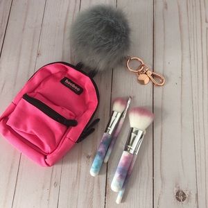 Mini backpack, makeup brushes, fluff ball